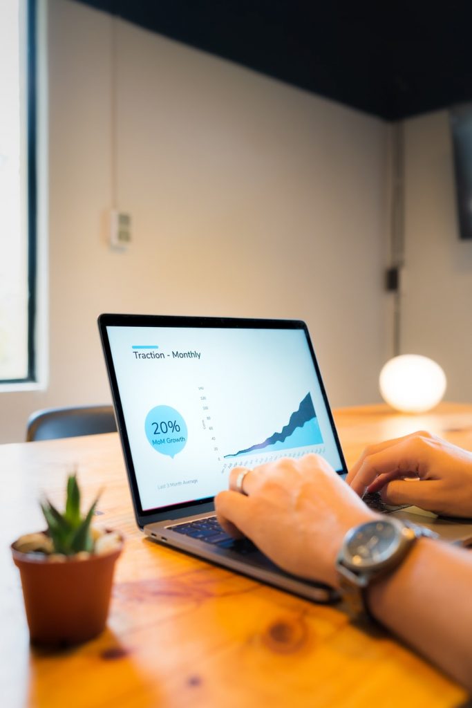 laptop with graphs on it